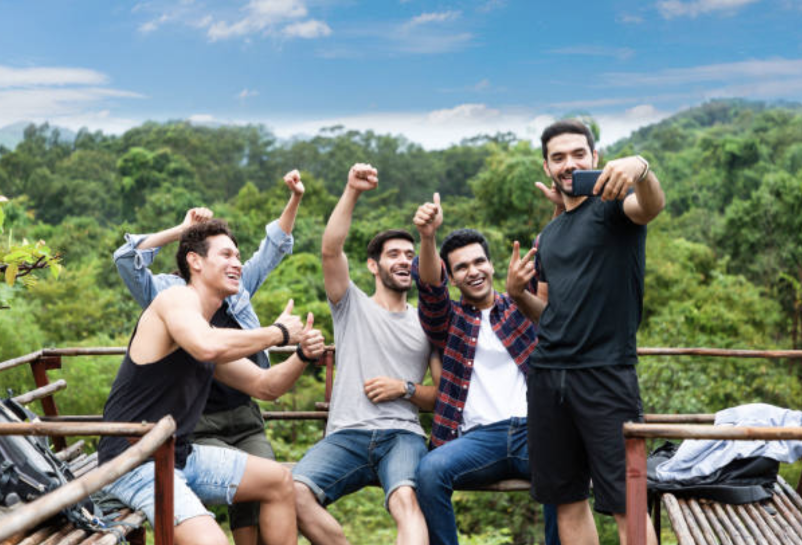 young men laughing while doing an activity